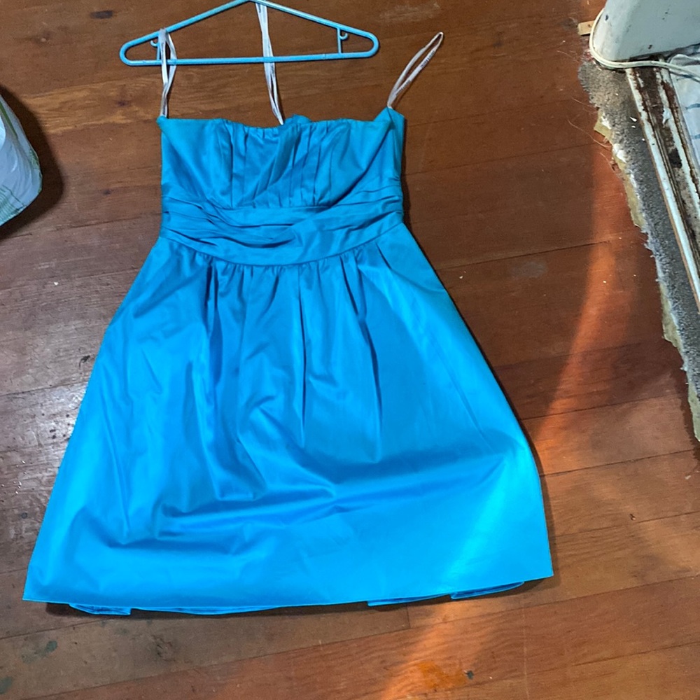 A strapless light blue cocktail dress from David’s bridal